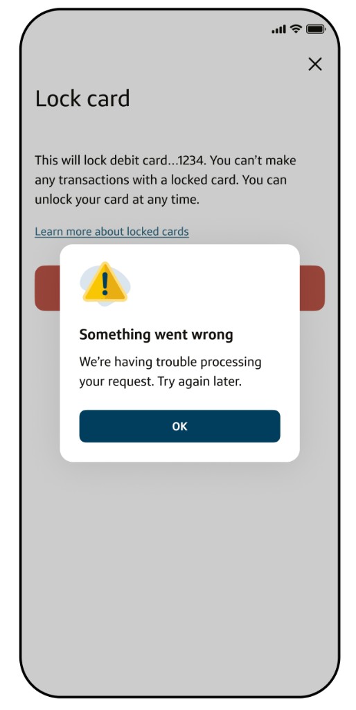 Lock card screen dimmed behind an error modal that says something went wrong when the request cannot be processed.